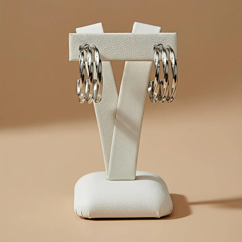 Τριπλά στριφτά σκουλαρίκια ασημί από ανοξείδωτο ατσάλι